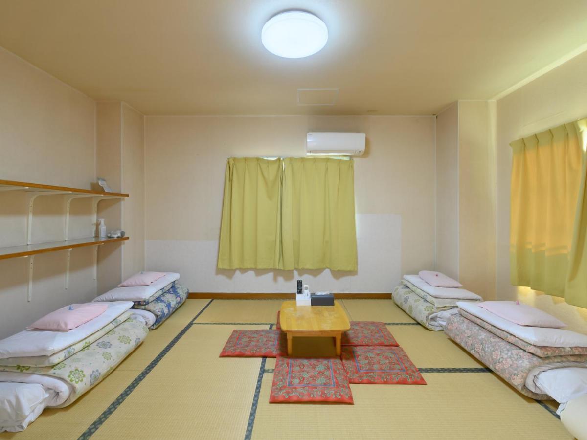 Отель Tabist Yuen No Yado Fujimi Фудзи Экстерьер фото