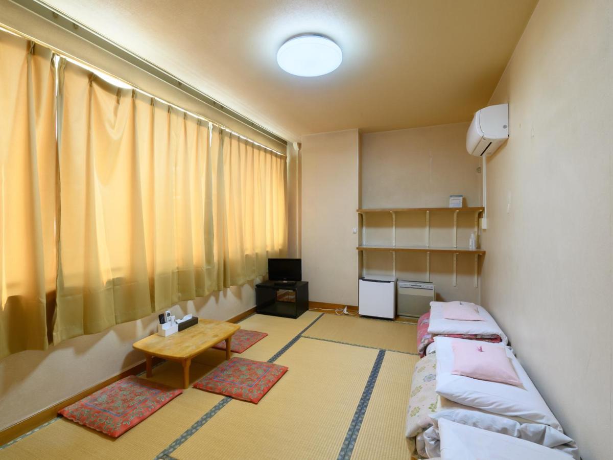 Отель Tabist Yuen No Yado Fujimi Фудзи Экстерьер фото