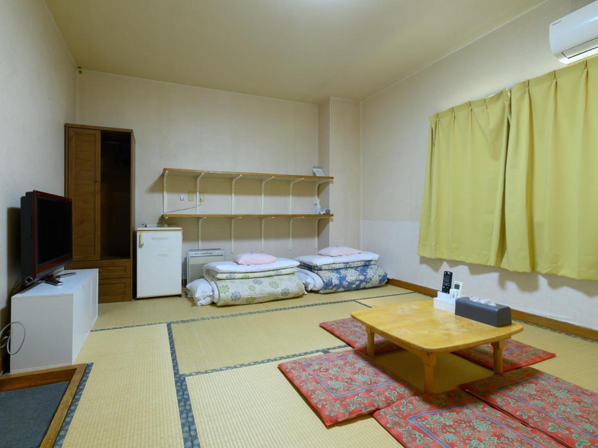 Отель Tabist Yuen No Yado Fujimi Фудзи Экстерьер фото